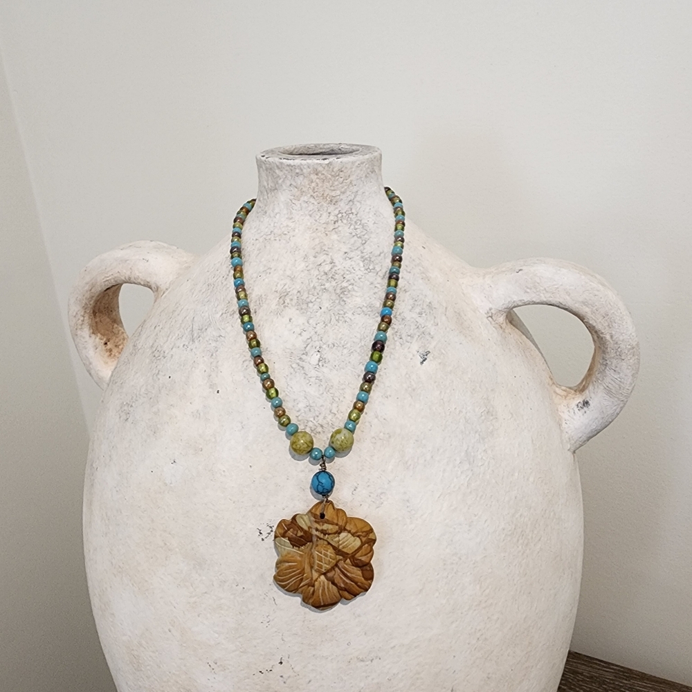 Handcrafted Beaded Necklace with Floral Pendant